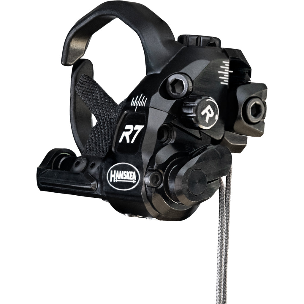 Black machined arrow rest with a raised containment arm and micro-adjust hardware, photographed three-quarter against a white background.