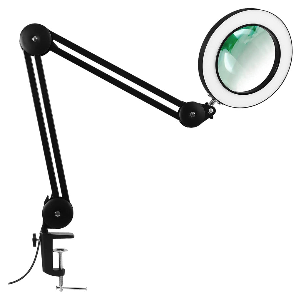 Articulated-arm magnifying bench lamp with a black jointed frame, round ring-lit lens and a table clamp, photographed against a white background.